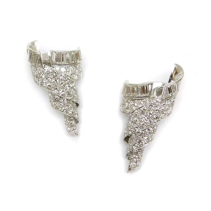 Pair of late Art Deco diamond spiral scroll earrings